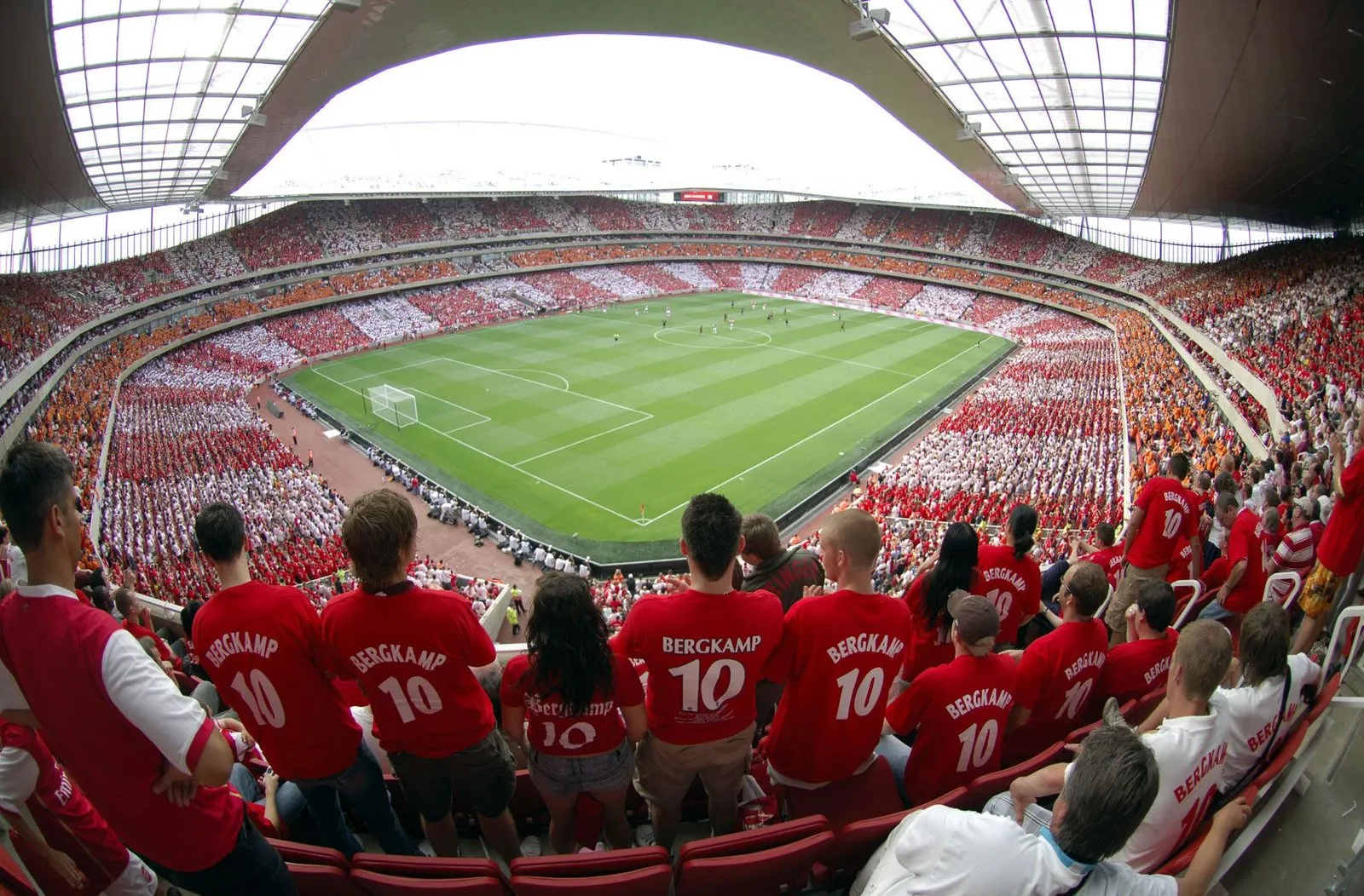 a group of people in a football stadium